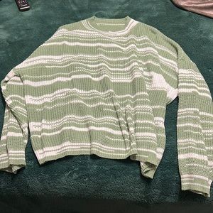 Green and white sweater